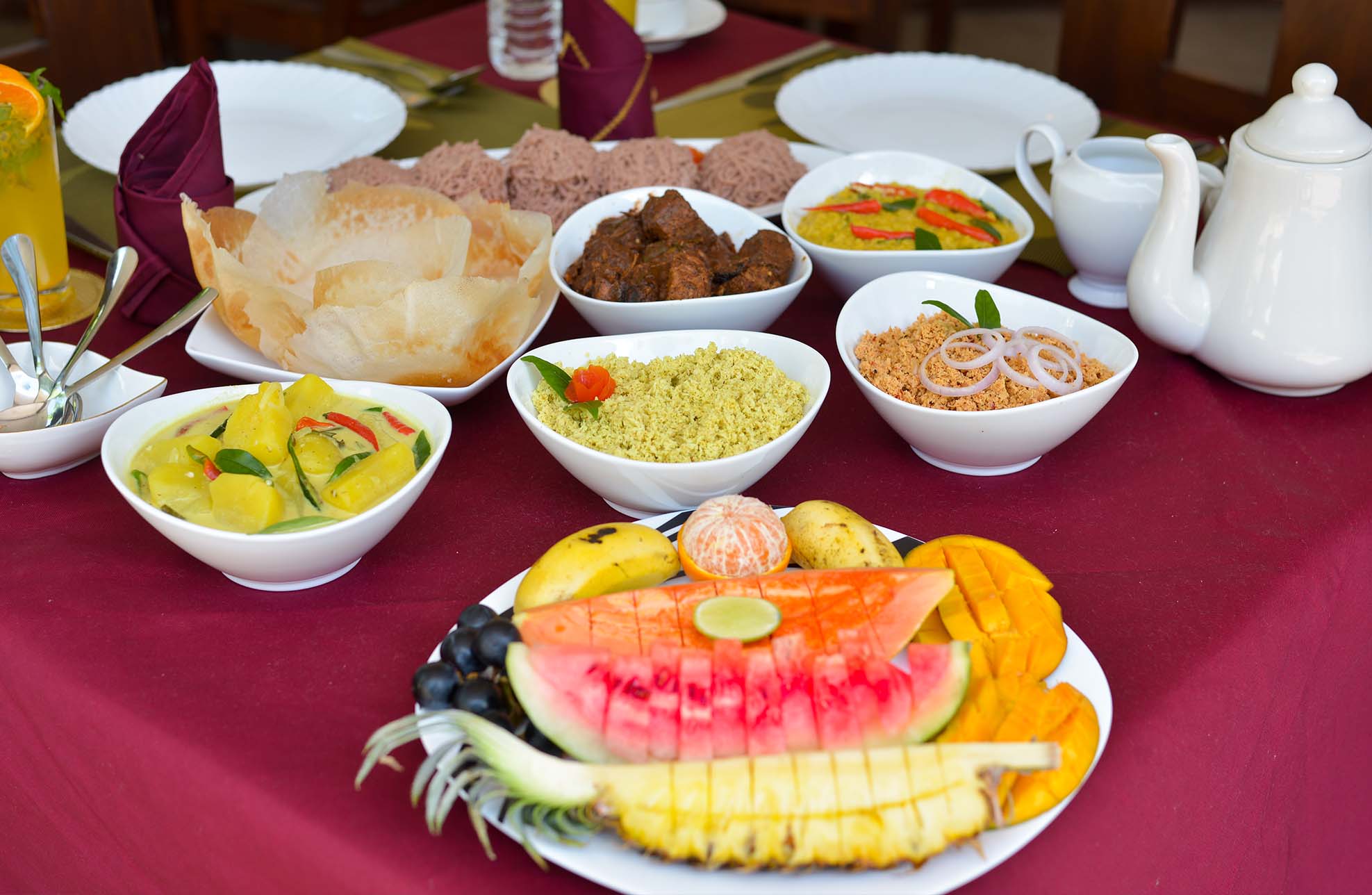 Delicious Sri Lankan feast served at Tranquil Escape villa in Hikkaduwa, Sri Lanka. Enjoy authentic cuisine in a luxurious setting